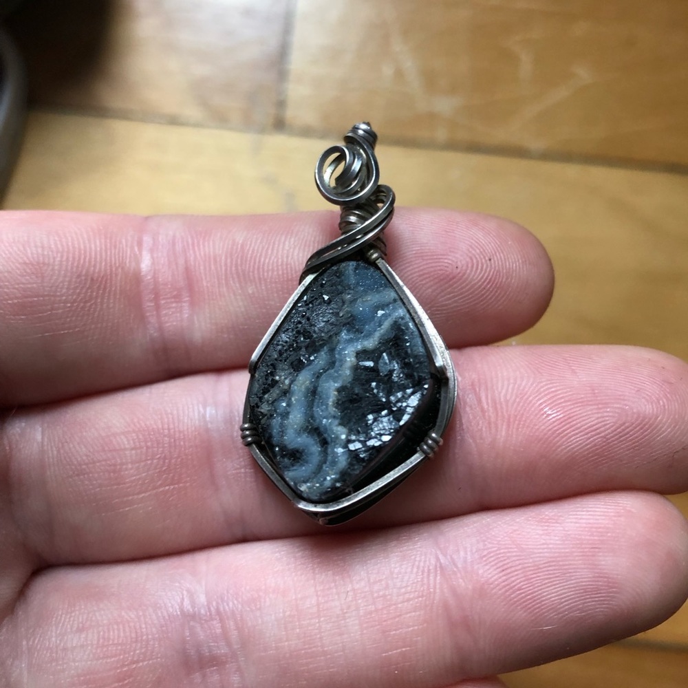 Wire wrapped sterling silver pendant